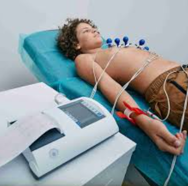 Diagram of an ECG waveform labeled P, Q, R, S, and T, showing one cardiac cycle on a grid