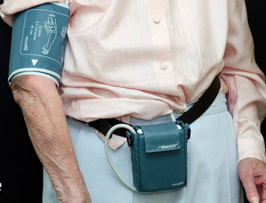 Ambulatory blood pressure monitor worn on a patient's arm for continuous 24 hour BP recording during daily activities